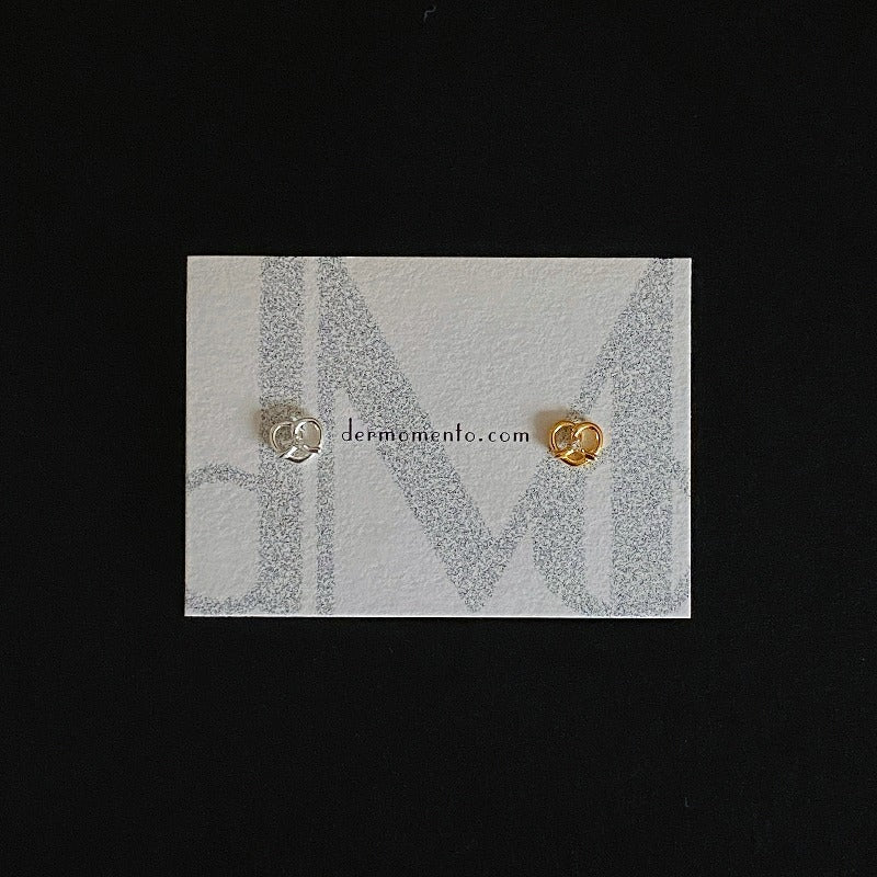 Made of sterling silver with a Pretzel shape 🥨 and adorned with dazzling cubic zirconia, subtle yet striking. Designed for everyday wear and special occasions alike.
