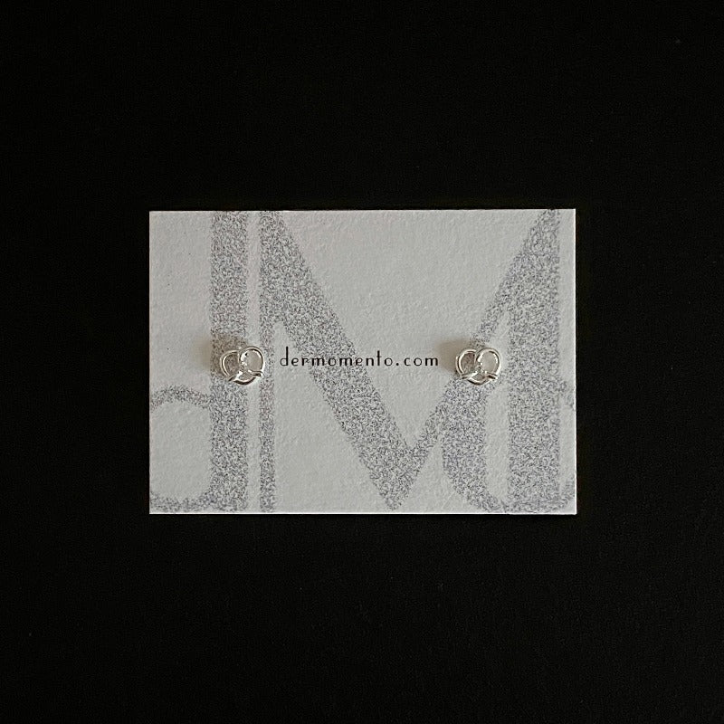 Made of sterling silver with a Pretzel shape 🥨 and adorned with dazzling cubic zirconia, subtle yet striking. Designed for everyday wear and special occasions alike.