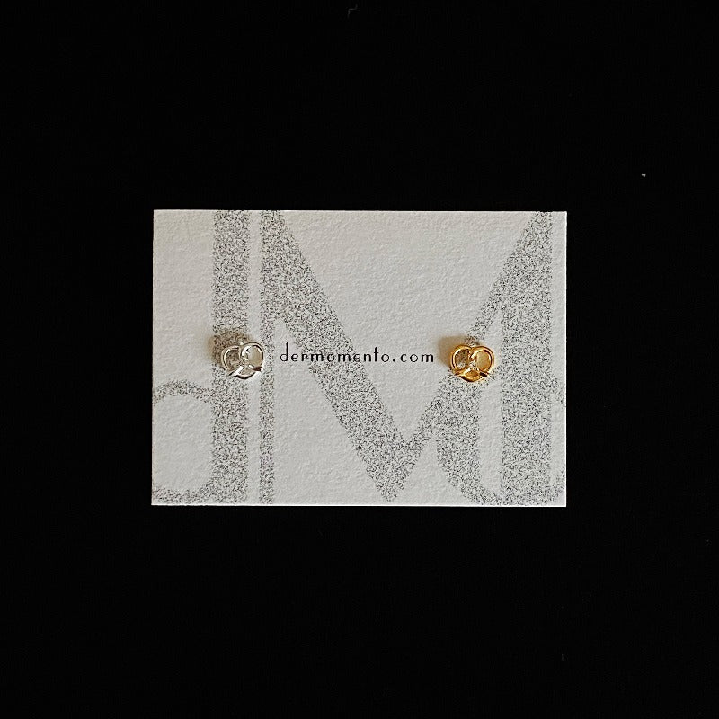 Made of sterling silver with a Pretzel shape 🥨 and adorned with dazzling cubic zirconia, subtle yet striking. Designed for everyday wear and special occasions alike.