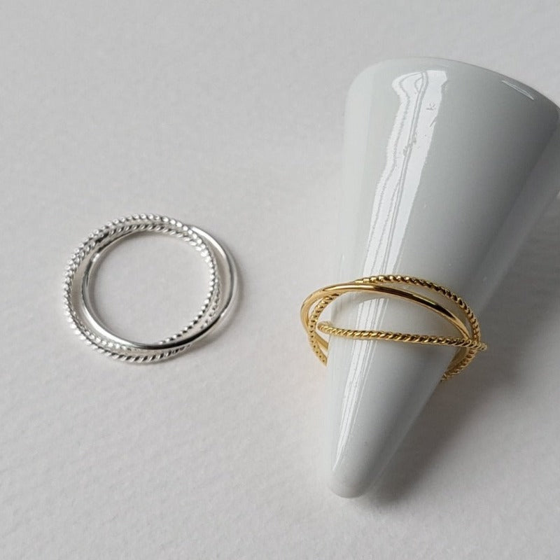 Composted of three different textured fine rings (3-in-1) A perfect versatile piece crafted in 18-karat gold vermeil silver for wearing alone or stacking together.