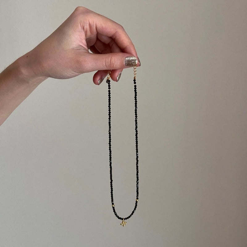 A CURATED SET OF PIECES METICULOUSLY CRAFTED WITH A COMBINATION OF TWINKLING BLACK SPINEL, LUSTROUS 18K GOLD VERMEIL STERLING SILVER BEADS, AND EXQUISITE NATURAL PEARLS