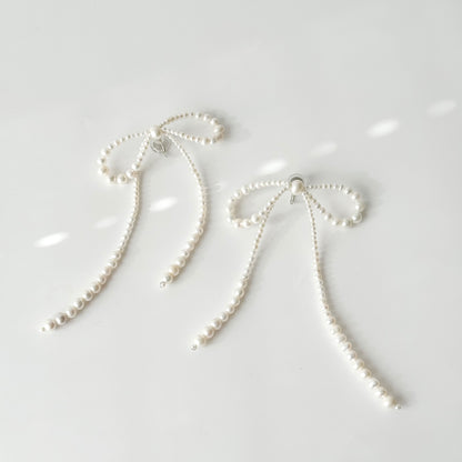COLETTE oversized freshwater pearl bow earrings with long ribbon tails