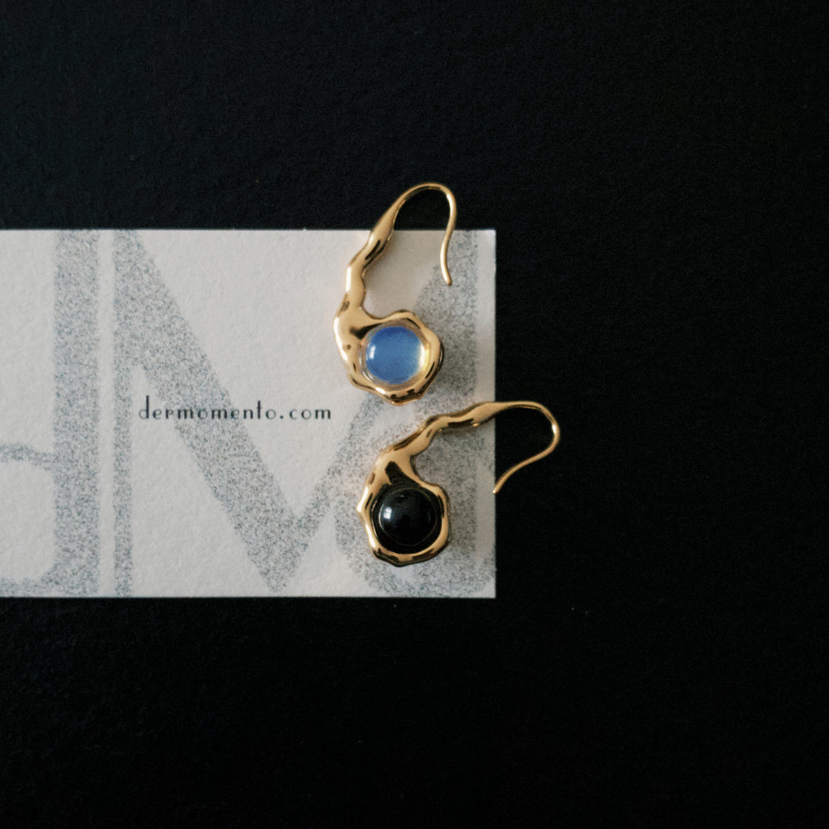 HELENA sculptural hook earrings with irregular curved metal contours