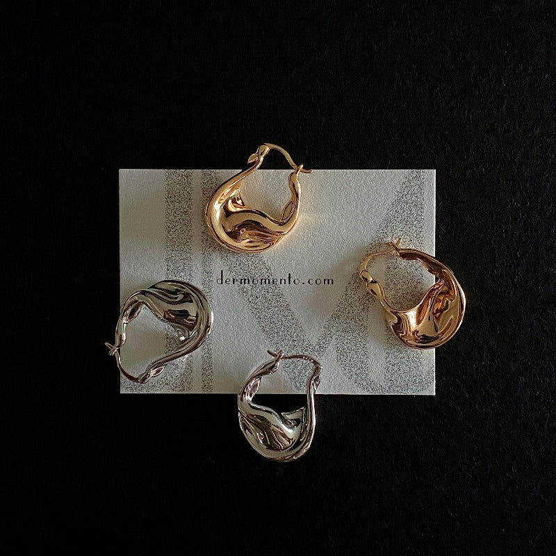 ASTRID asymmetrical curve hoop earrings in gold and silver