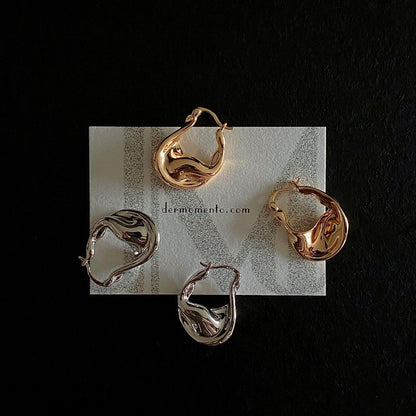 ASTRID asymmetrical curve hoop earrings in gold and silver