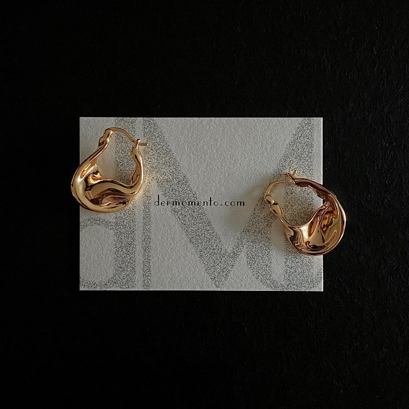 Sculptural gold vermeil hoop earrings with fluid, rounded curves
