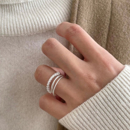 Composted of three different textured fine rings (3-in-1)  A perfect versatile piece crafted in sterling silver for wearing alone or stacking together.