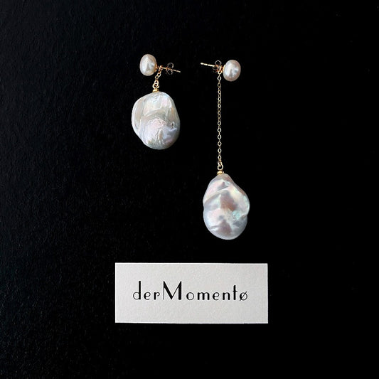 The Lovina Baroque Pearl Drop Earrings feature AB-style natural pearl studs paired with natural baroque pearl drops, allowing different wearing options - short, asymmetrical and long. Available in 14k gold-filled and sterling silver accents and can be customised in various styles (short-short, short-long, long-long).