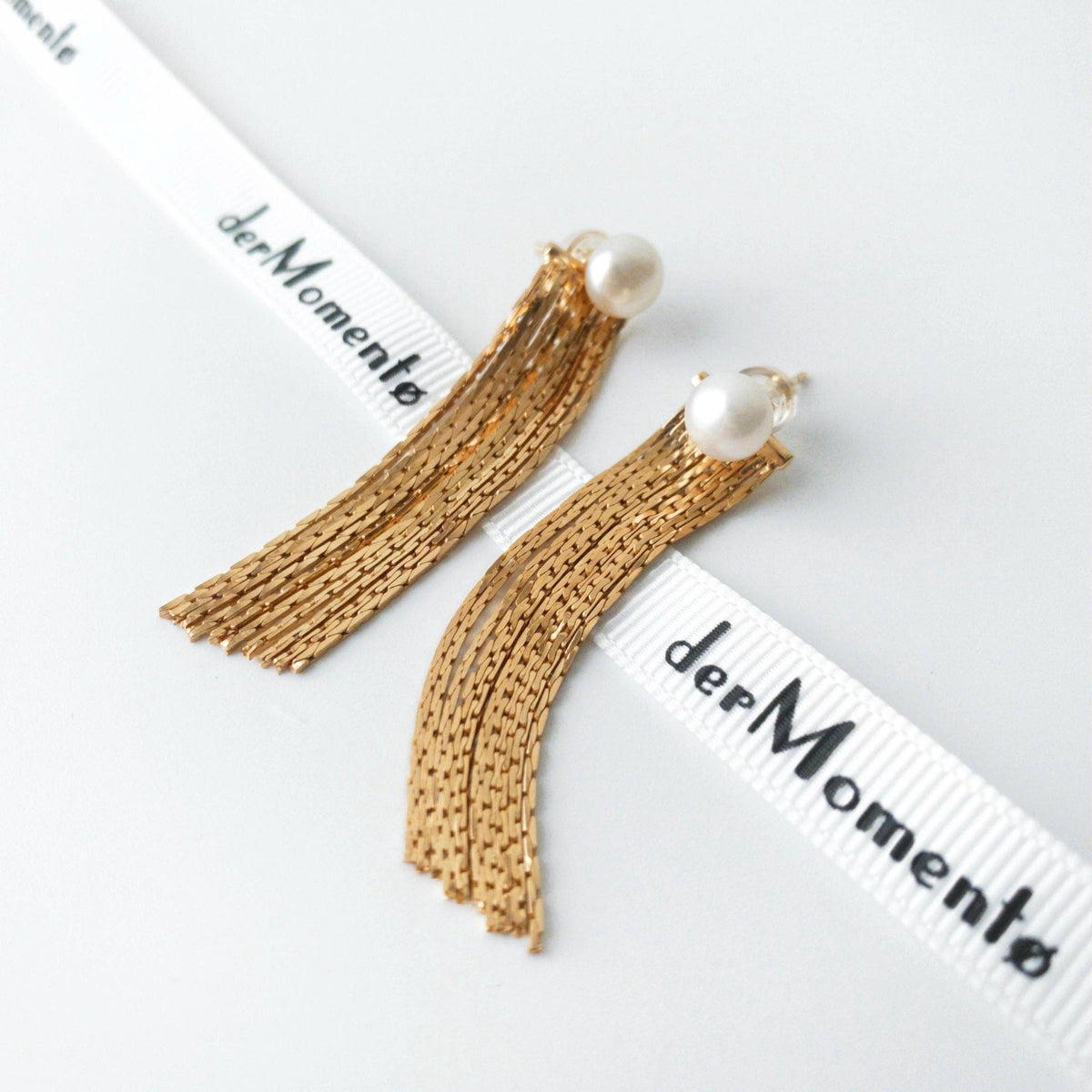 Textured gold vermeil chain tassels beneath round freshwater pearl studs