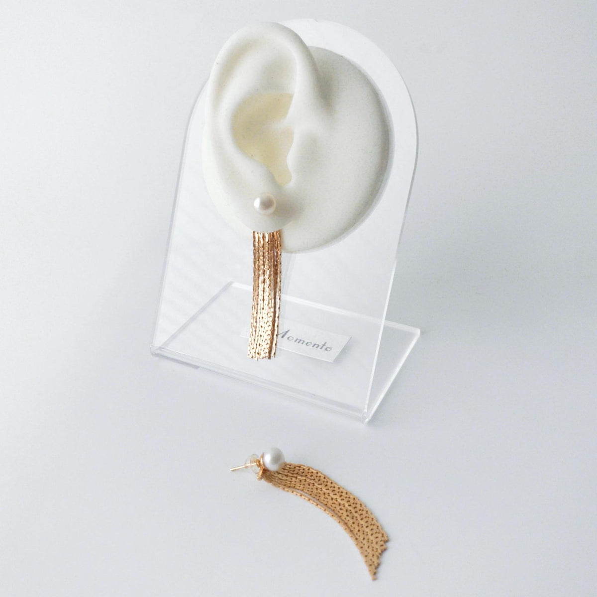 THEA detachable pearl tassel ear jackets shown with separate pearl stud and chain attachment