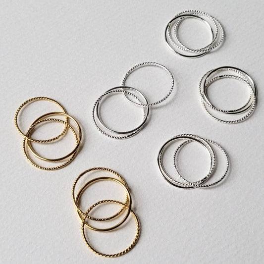 Composted of three different textured fine rings (3-in-1)  A perfect versatile piece crafted in 18-karat gold vermeil silver for wearing alone or stacking together.